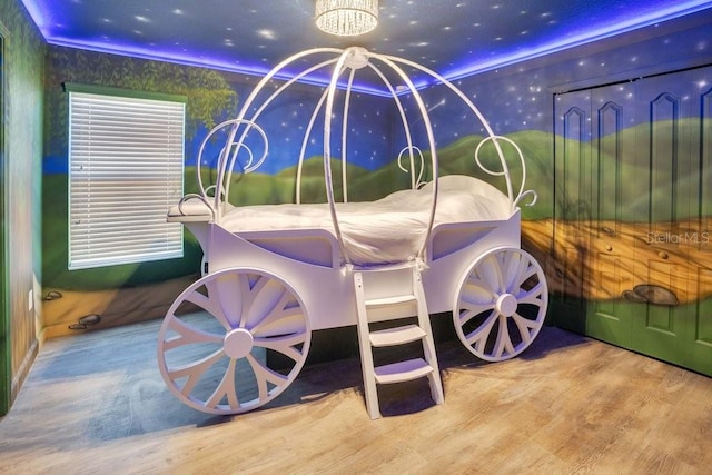 bedroom featuring light wood-type flooring