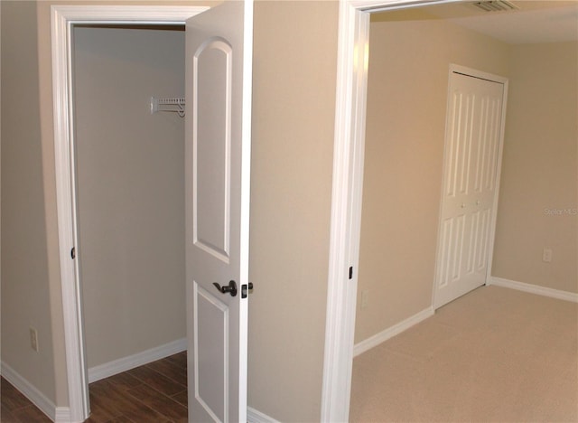 hall featuring dark hardwood / wood-style flooring