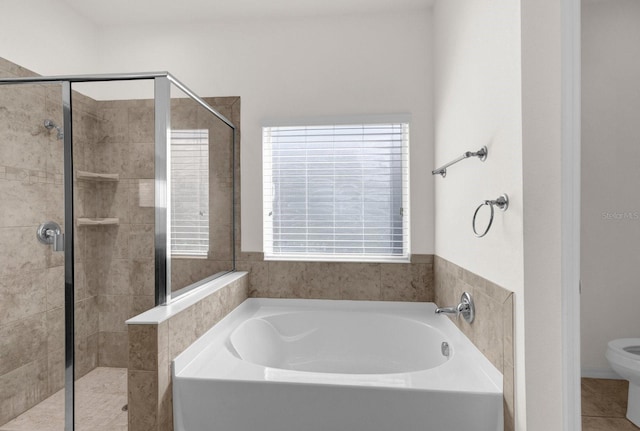 bathroom with shower with separate bathtub, toilet, and tile patterned flooring