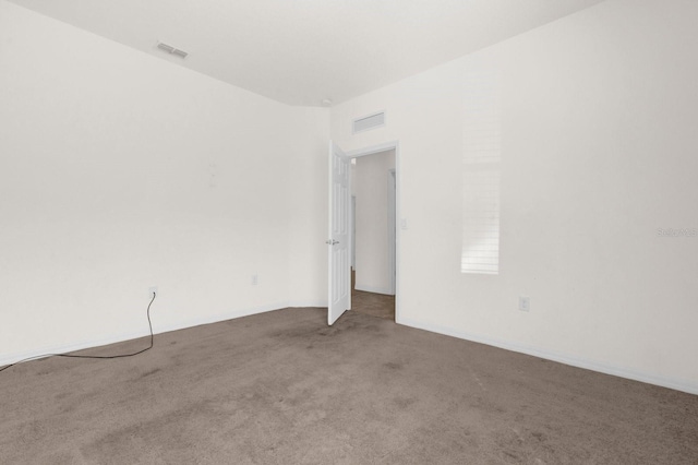 spare room with carpet