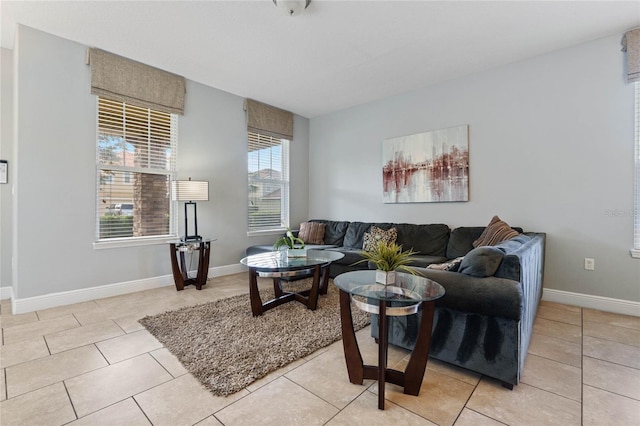 living room with light tile patterned floors