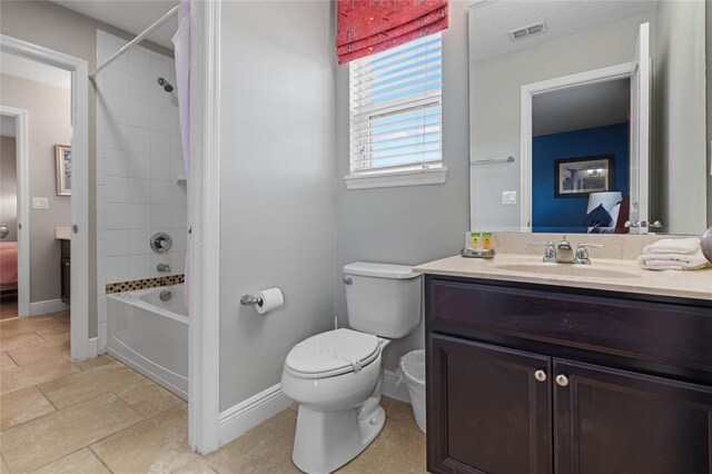 4204 Oakview Dr, Davenport, FL 33837 - bathroom with vanity, toilet, shower / bath combination, baseboards, and ensuite bathroom
