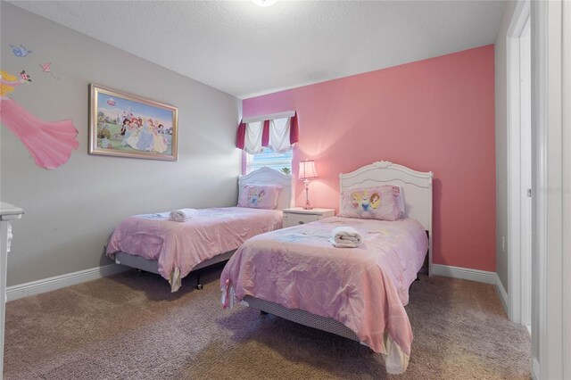 4204 Oakview Dr, Davenport, FL 33837 - bedroom featuring carpet flooring and baseboards
