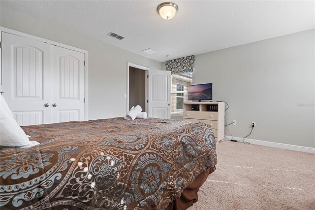 4204 Oakview Dr, Davenport, FL 33837 - bedroom with carpet floors, a closet, and baseboards