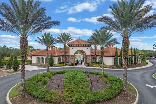 4204 Oakview Dr, Davenport, FL 33837 - view of building exterior featuring curved driveway