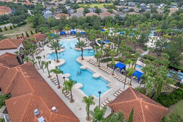 4204 Oakview Dr, Davenport, FL 33837 - community pool with a water slide and a water play area