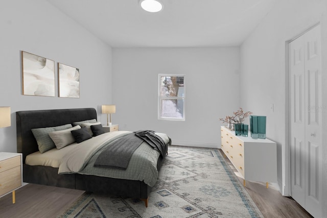 bedroom with light wood-type flooring