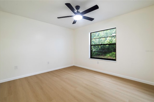 unfurnished room with ceiling fan and light hardwood / wood-style flooring