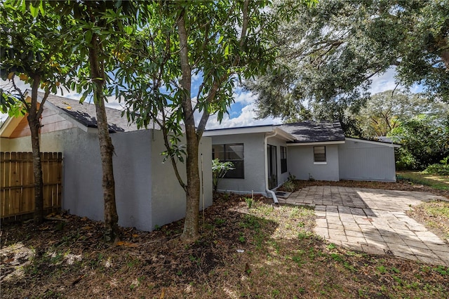 rear view of property with a patio area