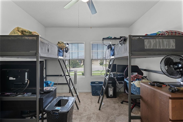 carpeted bedroom with ceiling fan