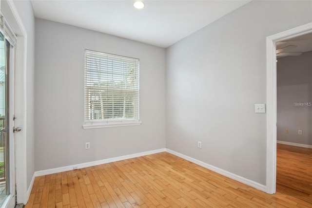 spare room with light wood-type flooring