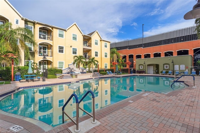 view of swimming pool featuring a patio