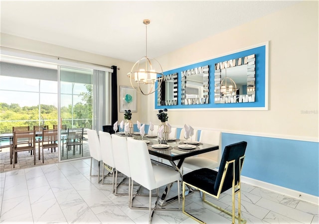 dining area with a chandelier