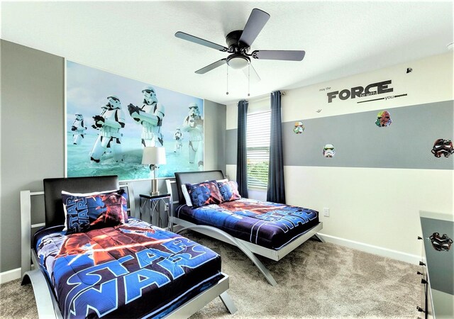 carpeted bedroom featuring ceiling fan