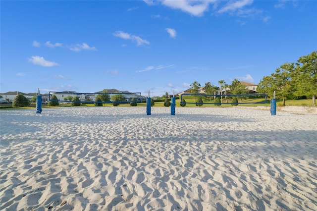 view of property's community featuring volleyball court