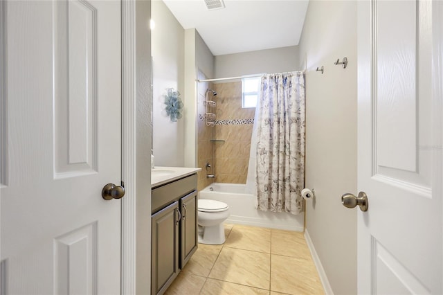 full bathroom with shower / bath combo, tile patterned flooring, vanity, and toilet