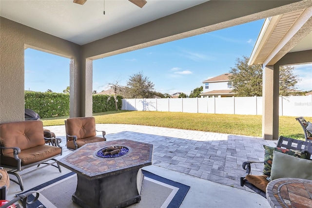 view of patio featuring an outdoor fire pit