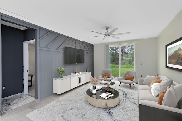 living room with light tile patterned floors and ceiling fan