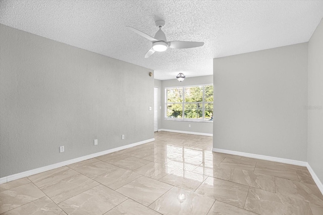 unfurnished room featuring a textured ceiling and ceiling fan