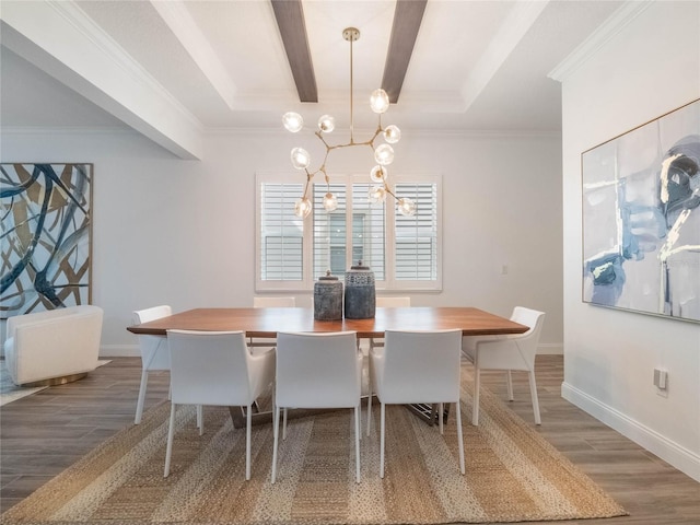 dining room with hardwood / wood-style flooring, beam ceiling, ornamental molding, and a notable chandelier