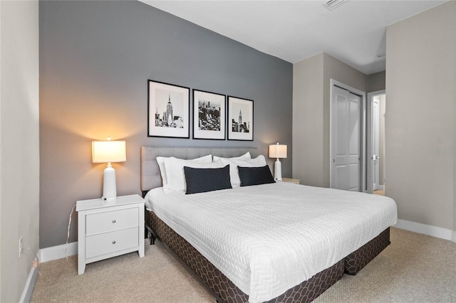 carpeted bedroom featuring a closet