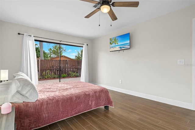 bedroom with ceiling fan, dark wood-type flooring, and access to outside