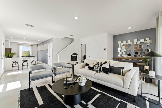 living room featuring light tile patterned flooring