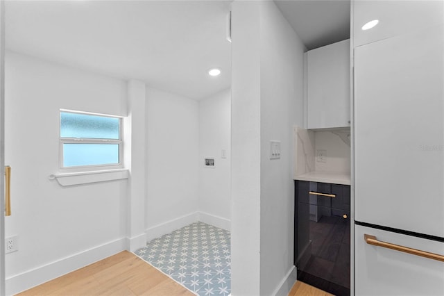 bathroom featuring wood-type flooring and vanity