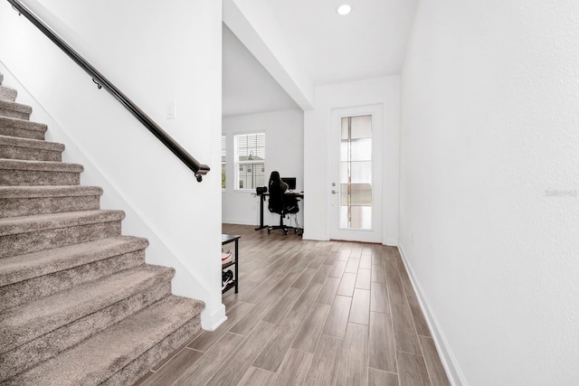 entrance foyer featuring hardwood / wood-style floors