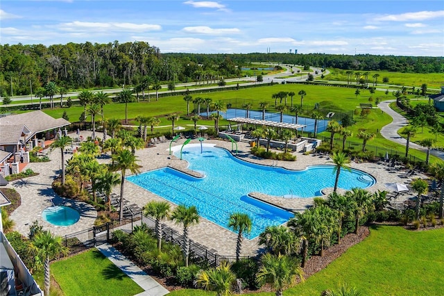 view of swimming pool featuring a patio