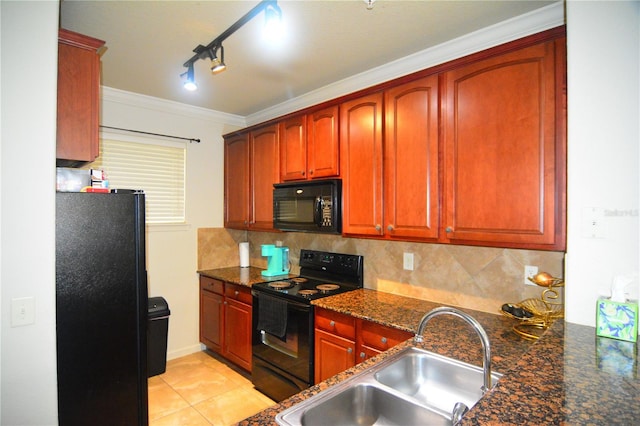 kitchen featuring decorative backsplash, sink, black appliances, light tile patterned floors, and dark stone countertops