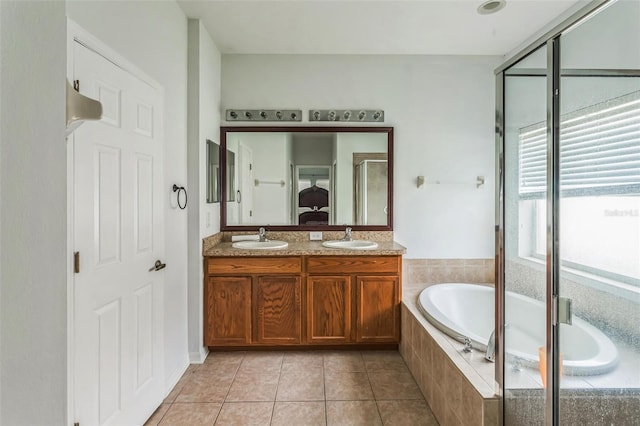 bathroom featuring separate shower and tub, vanity, tile patterned flooring, and plenty of natural light