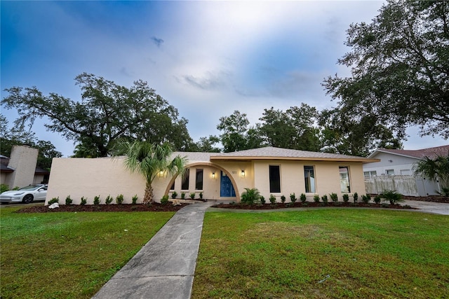 view of front of home with a front yard