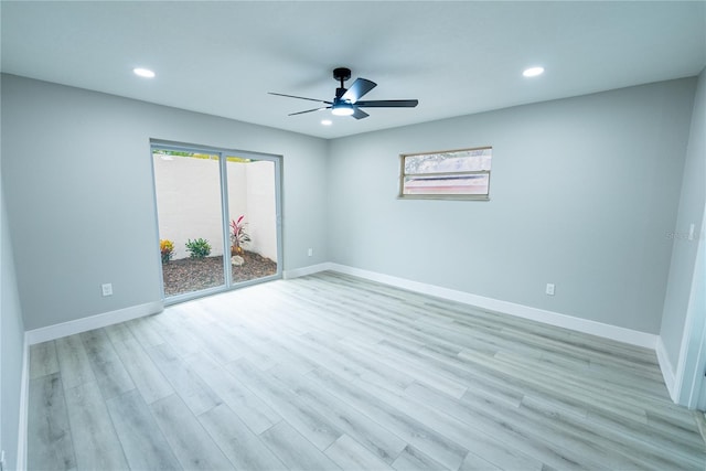 empty room with light wood-type flooring and ceiling fan