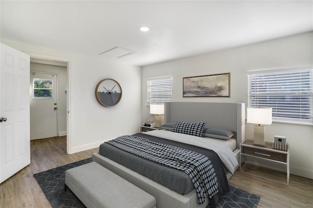 bedroom featuring dark hardwood / wood-style floors