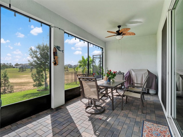 3286 Hanging Tide St, Winter Garden, FL 34787 - sunroom / solarium with ceiling fan and outdoor dining area