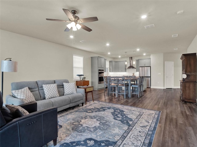 3286 Hanging Tide St, Winter Garden, FL 34787 - living area with ceiling fan, dark wood-style floors, recessed lighting, and baseboards