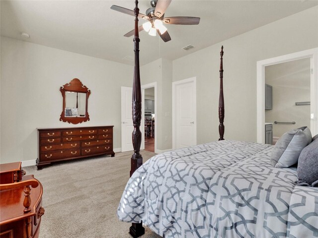 3286 Hanging Tide St, Winter Garden, FL 34787 - carpeted bedroom with a ceiling fan, ensuite bath, and baseboards