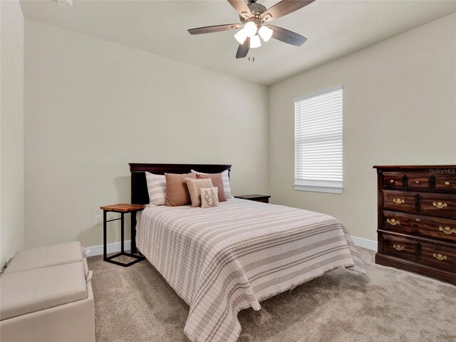 3286 Hanging Tide St, Winter Garden, FL 34787 - bedroom with carpet flooring, baseboards, and ceiling fan