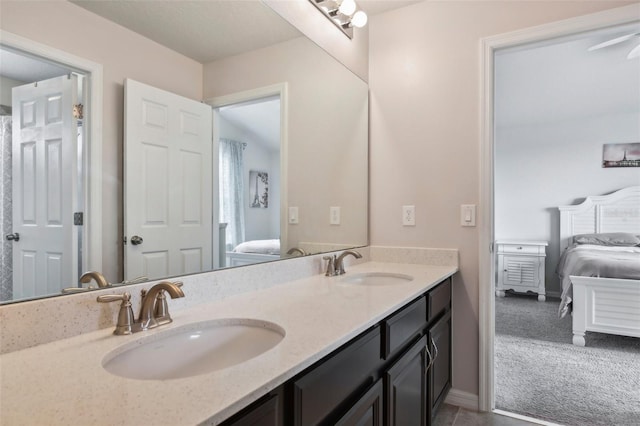 bathroom with vanity and ceiling fan