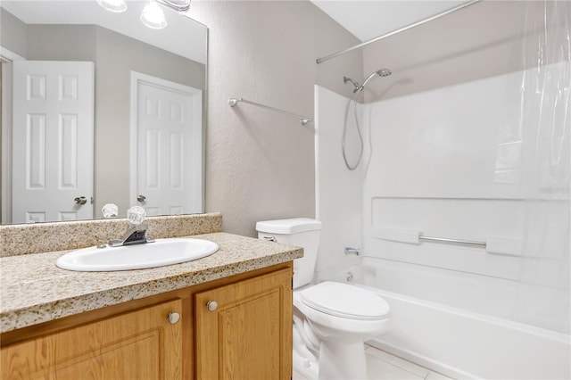 full bathroom featuring toilet, tile patterned flooring, vanity, and tub / shower combination