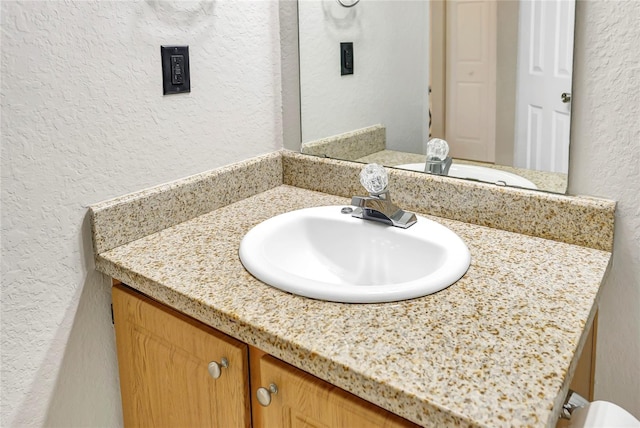 623 Dory Ln Unit 308, Altamonte Springs, FL 32714 - bathroom featuring a textured wall and vanity