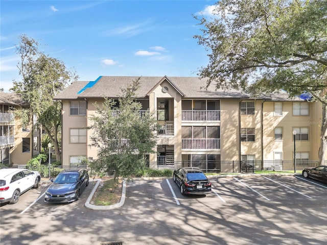 623 Dory Ln Unit 308, Altamonte Springs, FL 32714 - view of property featuring uncovered parking