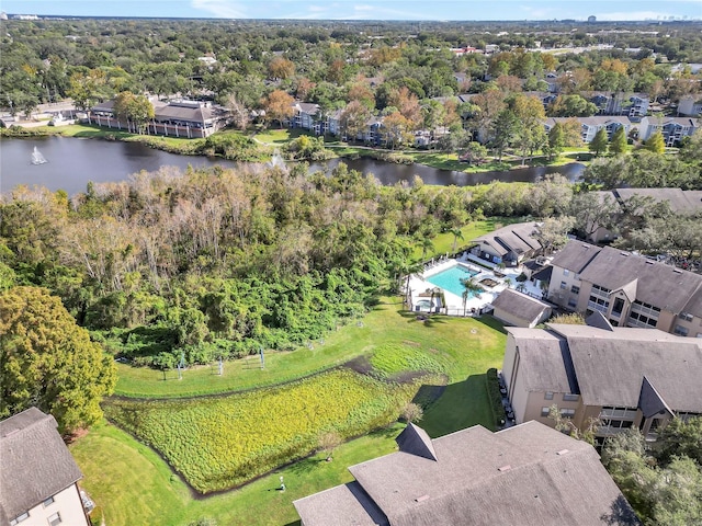 birds eye view of property featuring a water view