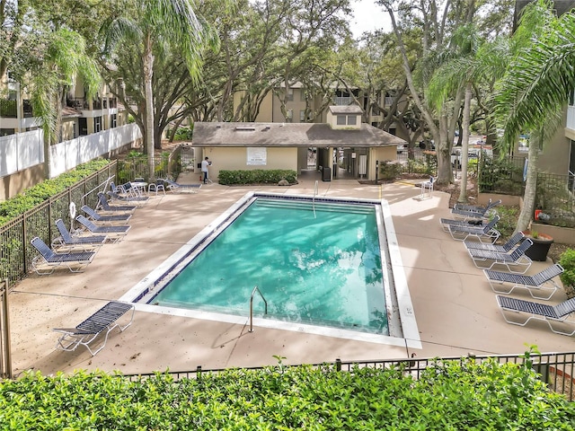 view of pool featuring a patio