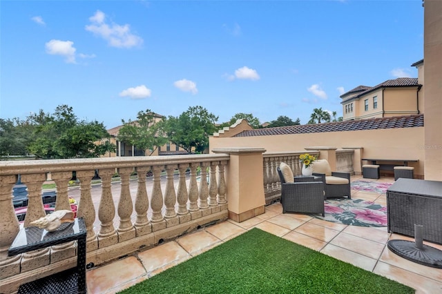 view of patio / terrace featuring central AC and a balcony