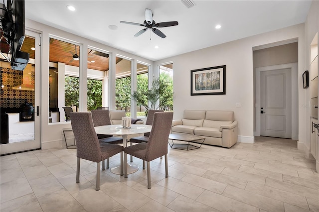 dining room with ceiling fan