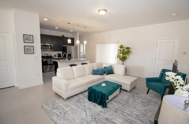 living room featuring light tile patterned floors