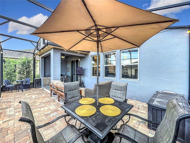 view of patio / terrace with a lanai and an outdoor living space