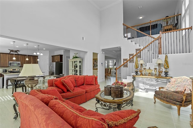 tiled living room featuring a towering ceiling